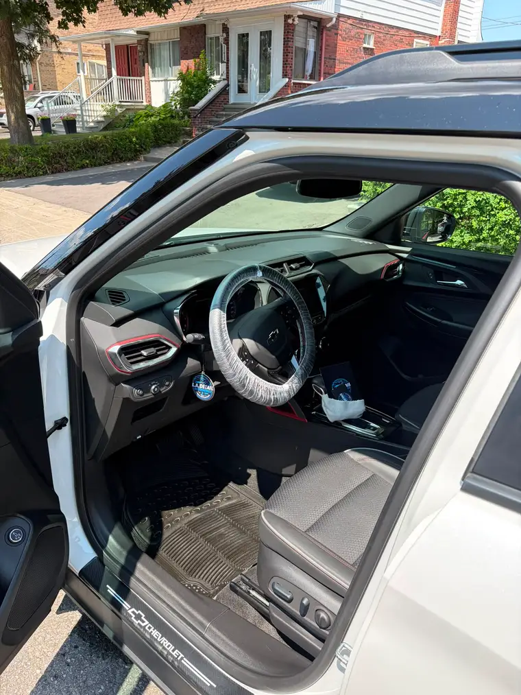Chevrolet Trailblazer RS interior with red trim accents after an interior deep clean